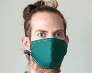 guy with reusable face mask green